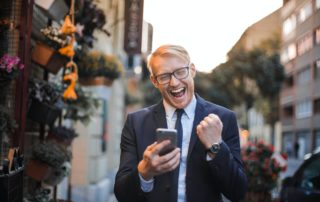 man-in-black-suit-jacket-received-a-good-news-3760260